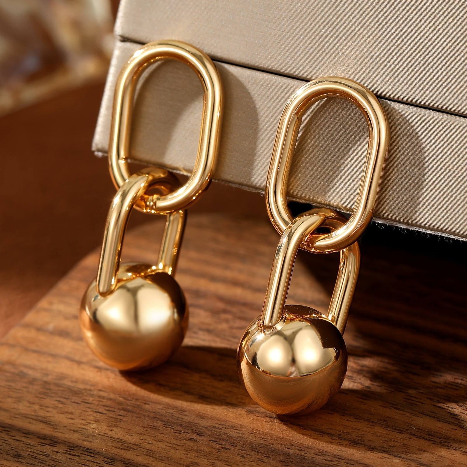 Par de Brincos Argola Dupla Elos Bola Dourada | By Mireva