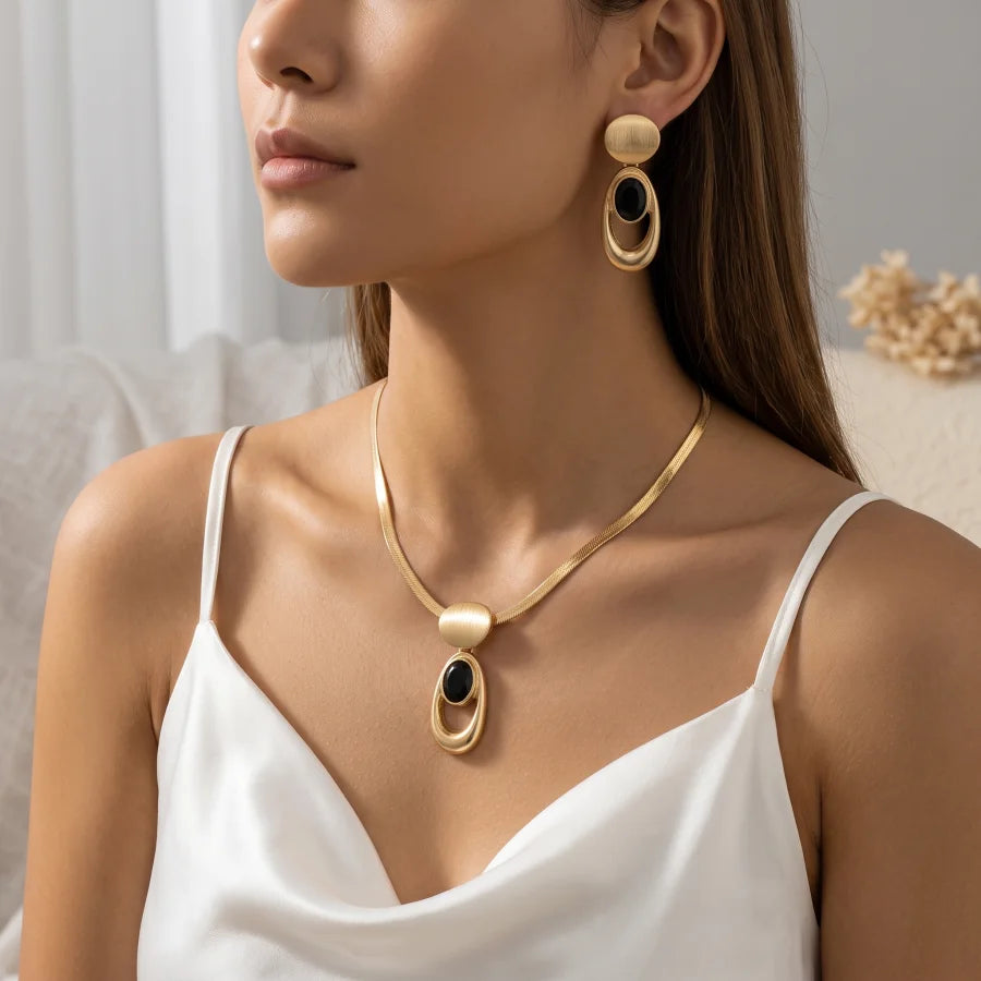 Conjunto de Joias Dourado Preto Geométrico