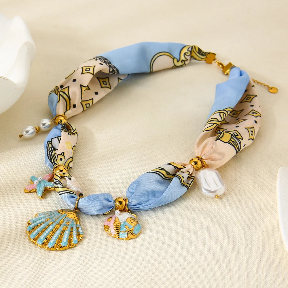 Colar Ocean Colors – Estrela-do-Mar e Concha Esmaltadas em Aço Inox Banhado a Ouro 18K