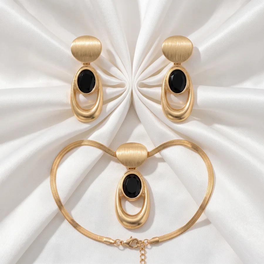 Conjunto de Joias Dourado Preto Geométrico