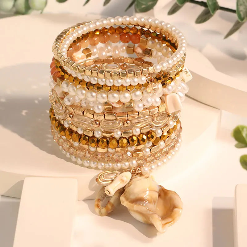 Kit Pulseiras Boho Dourado & Pérola — Detalhe de Concha, Luxo Artesanal para Verão