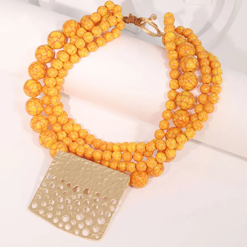 Colar Statement Vintage Contas Laranja Pingente Furado Dourado | By Mireva