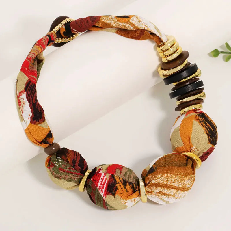 Colar Trançado Colorido Contas Estampadas Douradas | By Mireva